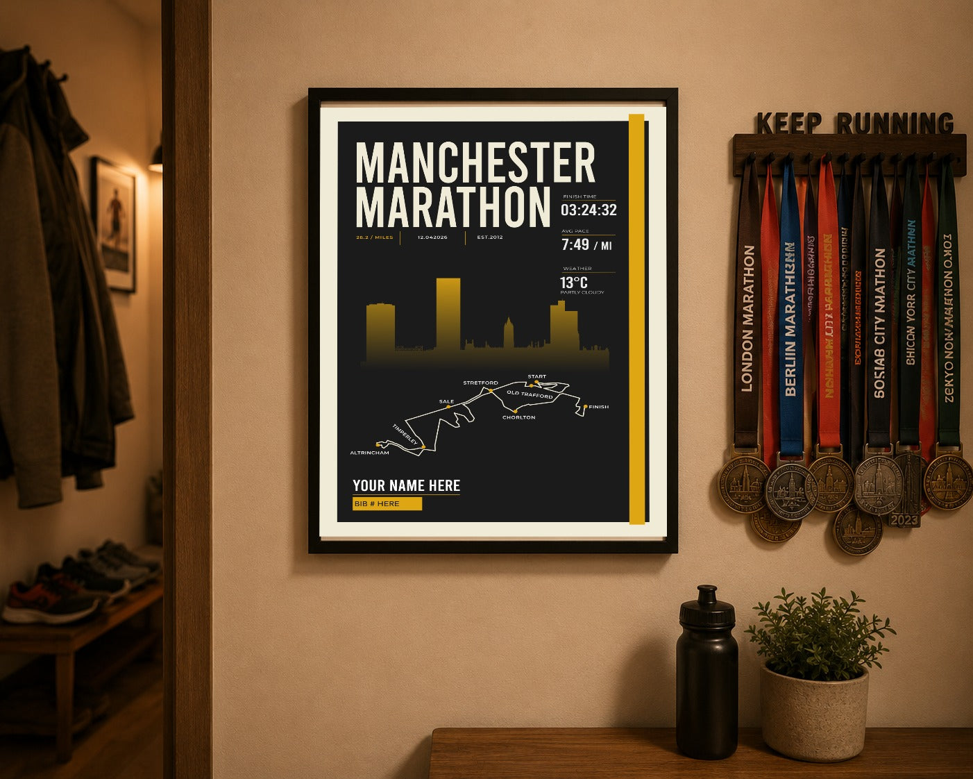 Manchester Marathon print above a runner's medal display